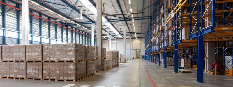 View of full warehouse with forklift A view of full warehouse with forklift